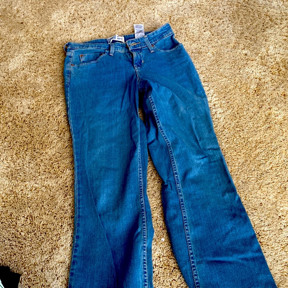 Signature mid rise boot cut jeans by Levi strauss